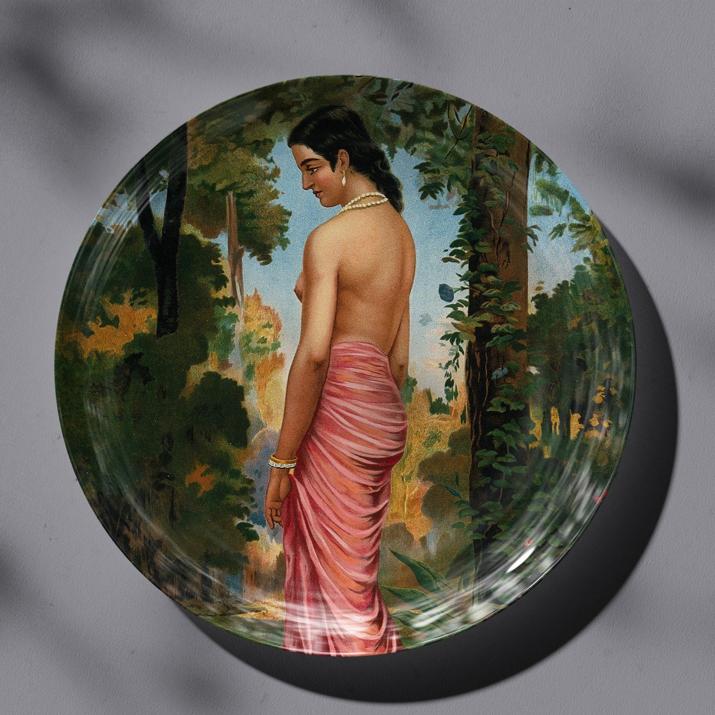 Semi-clothed woman by a river bank called Varini by Ravi Varma Ceramic Plate for Home Decor