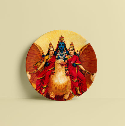 Vishnu accompanied by his wives riding on Garuda by Ravi Varma Ceramic Plate for Home Decor