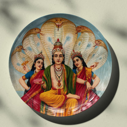 Vishnu flanked by two wives resting on Shesa by Ravi Varma Ceramic Plate for Home Decor